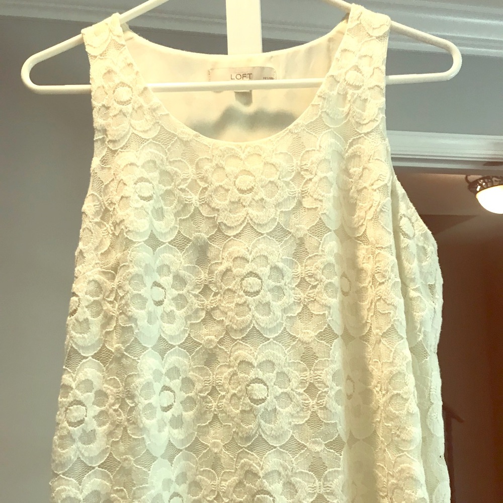White floral and lace sleeveless blouse